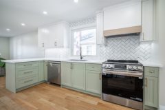 modern-kitchen-design-with-light-green-and-white-cabinets-1536x1024