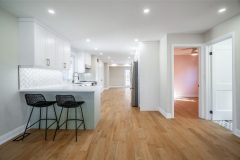 modern-kitchen-with-bar-island-and-chairs-1536x1024