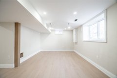 chic-basement-living-space-after-full-renovation