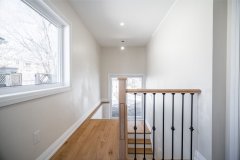 heavy-duty-wood-staircase-with-metal-balusters