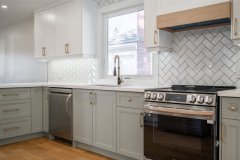 modern-kitchen-with-white-cabinets-and-built-in-appliances