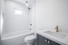 modern-white-bathroom-design-with-chrome-fixtures-1536x1024