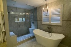 bathroom-with-walk-in-shower-and-white-ceramic-tub-640x480