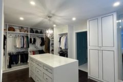 chic-walk-in-closet-with-white-cabinets-450x600