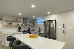 kitchen-island-with-black-bar-chairs