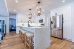 modern-marble-kitchen-island-with-pendant-lights
