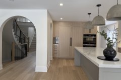 kitchen-with-grey-and-beige-cabinets-and-modern-appliances
