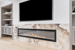 living-room-with-huge-tv-and-electric-fireplace
