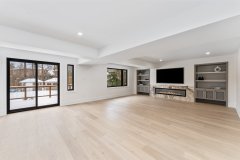 living-room-with-multi-level-ceiling-with-pot-lights