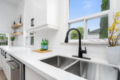 kitchen-with-white-countertop-and-stainless-sink-1536x1024