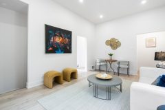 posh-living-room-design-with-stylish-furniture-1536x1024
